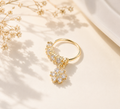 Gold Flower Charm Nose Ring with shiny gems (dangle ring)